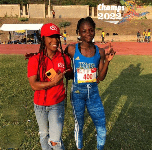 Olympian and Grace Ambassador, Shelly-Ann Fraser-Pryce takes a photo with Hydel High's Brianna Lyston
