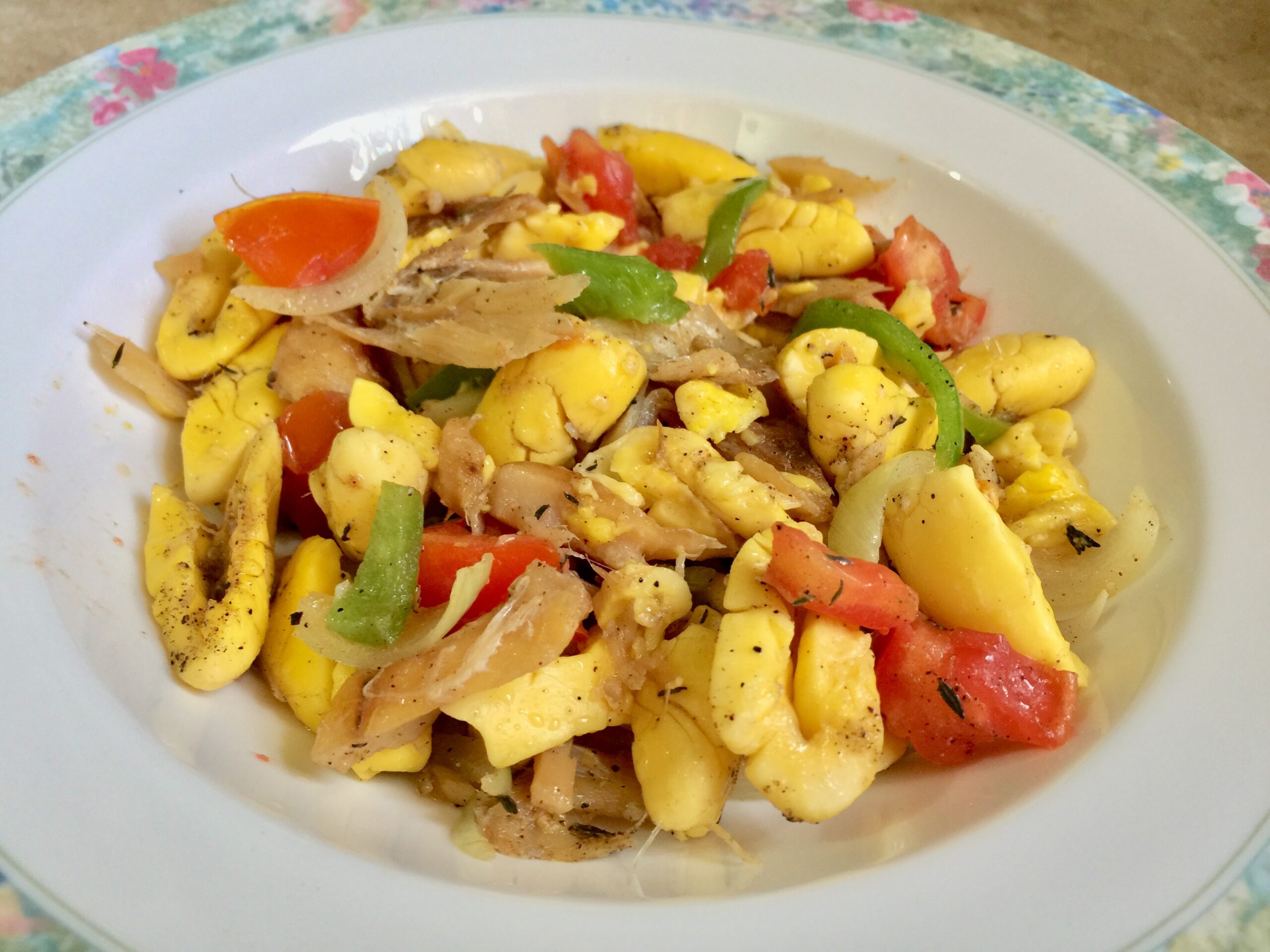 Caribbean -Jamaican ackee and Saltfish seasoned with onions, tomatoes scallions, red hot peppers
