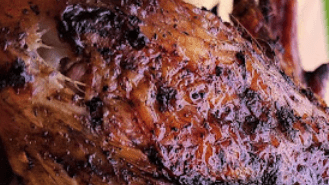 Jamaica jerk chicken marinated with spices and slow coo over fire or grill
