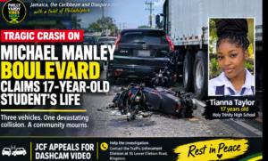 Three-vehicle collision involving a motorcycle, black Honda CR-V and heavy truck on Michael Manley Boulevard in Kingston, Jamaica.